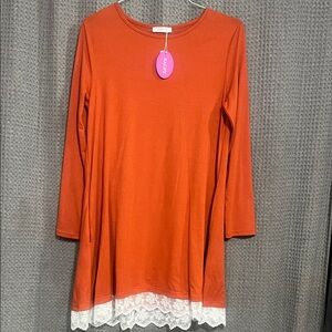 Burnt Orange Long Sleeve Dress with Lace Hem. Super sweet!